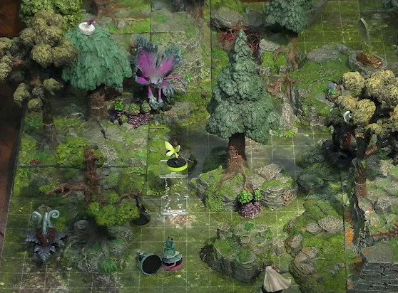 A battlemap of a forested glade with a variety of trees, mushrooms, and fey-like, purple plants. A small fairy sits atop a tree overlooking the party. Wicander lies on the ground next to Tyranny. Thimble flies 10 feet in the air near a tree with Kattigan below her. Teor stands just behind a nearby rocky outcropping. Two large purple flowers with four petals sit about fifty feet apart. A standing stone sits on a rocky platform near the glade’s center. In one corner of the glade is another raised rocky outcropping.