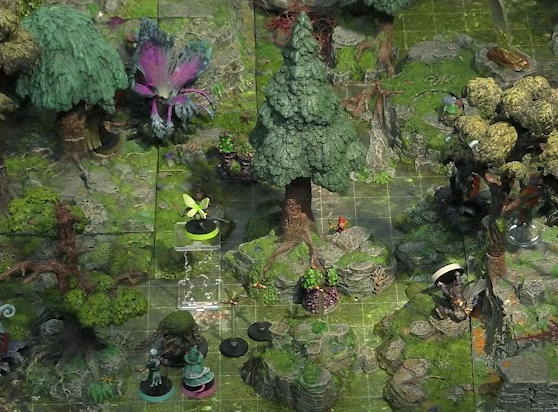 A battlemap of a forested glade with a variety of trees, mushrooms, and fey-like, purple plants. Teor lies on his back some distance away from a red-capped gnome-like creature wielding a sickle. Three pixies fly in the middle of the party. Wicander and Tyranny face off against a shambling mound. Thimble flies 10 feet in the air near a tree. Kattigan stands beneath a large purple flower with four petals.