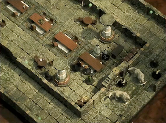 A battlemap of a large stone banquet chamber with surrounding hallways. Photarch Yanessa lies on the ground near a table next to an attendant Lux. On the other side of the table is King Augustus Valian, a Hound, and a druid. Outside the south entrance of the chamber are Filoneus Halovar with his two dogs Wrath and Judgement, as well as two party guests next to them. Inside the chamber are some long tables and chairs and marble pillars holding up the ceiling.