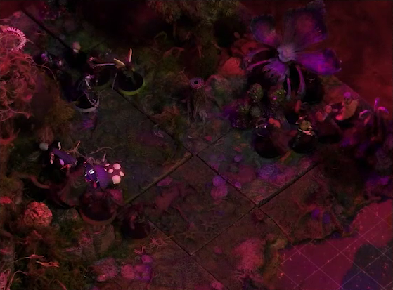 A battlemap of a forest clearing with a large leafless Hawthorn tree near the center. Fake smoke rises from that tree and others at the edges of the map. Thimble, Kattigan, Wulferic, Vaelus, Occtis, Pin, and Ulbid Morn stand near the tree. A number of Candescent Creed members and fairy poachers are scattered around the area, especially at the base of the Hawthorn tree. A huge purple flower is at the edge of the battlemap near a lake.
