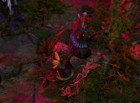 A battlemap of a forest clearing. Thimble faces off against two Candescent Creed members, one of which has a “DEAFENED” status ring around her miniature. They are at the base of a large Hawthorn tree.