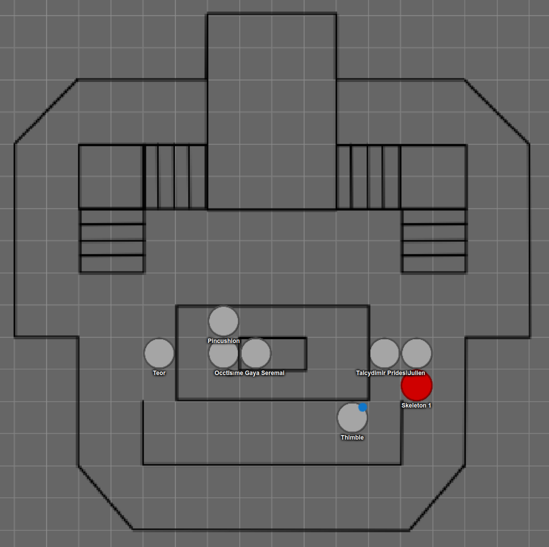 A basic Roll20 battlemap of a chamber shaped approximately like a skull. Two staircases at the top form the eyes and a hallway at the bottom looks like a grinning mouth. Tokens for Teor, Pincushion, Occtis, Dame Gaya Seremai, Talcydimir Pridesire, Julien, Thimble, and Skeleton 1 are grouped above the mouth.