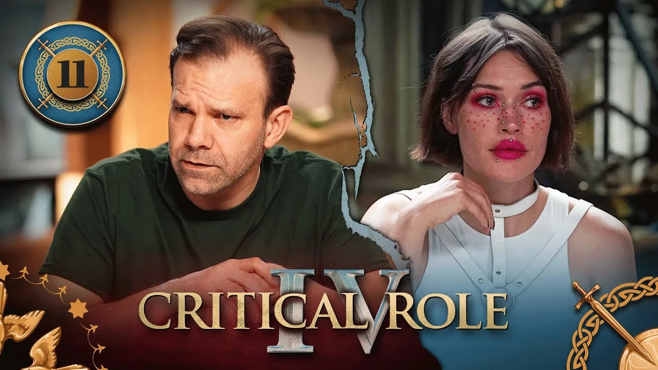 Thumbnail for Critical Role IV episode 11. A split image having the effect of cracked plaster, with a photo of Liam on the left and Whitney on the right. Liam leans forward, looking worried, his hands clasped in front of him. Whitney stares off into the distance, worried but attentive, her hand resting on the side of her neck. Liam wears a dark green T-shirt. Whitney wears a white tanktop with white leather straps around her neck and shoulders meeting in a metal ring over her chest. Pink makeup paints her lips, around her eyes, and in many dots on her cheeks. A number of round silver balls appearing to be piercings are placed below her lower lip, on her philtrum, on the sides of her nose, and on her right eyebrow.