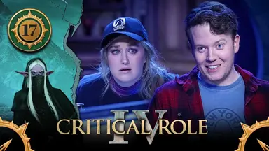 Thumbnail for Critical Role IV episode 17, with a green emblem around the episode number and compass arrows in the bottom corners. A split image having the effect of cracked plaster, with art of Vaelus on the left and photos of Ashley and Brennan on the right. Vaelus is a purple-skinned elf with long pointed ears sticking out to the sides. She wears a pure black robe, a black hood, and a black chainmail veil covering the lower half of her face. Two curtains of white hair reach down to her chest. She glares forward. The photos of Ashley and Brennan are photoshopped together. Ashley sits at the table, looking scared. Brennan smiles, a sadistic grin on his face, his left eyebrow raised. Ashley wears a “Dark Horse Comics” ballcap. Brennan wears a New York Public Library T-shirt under a flannel button-up.