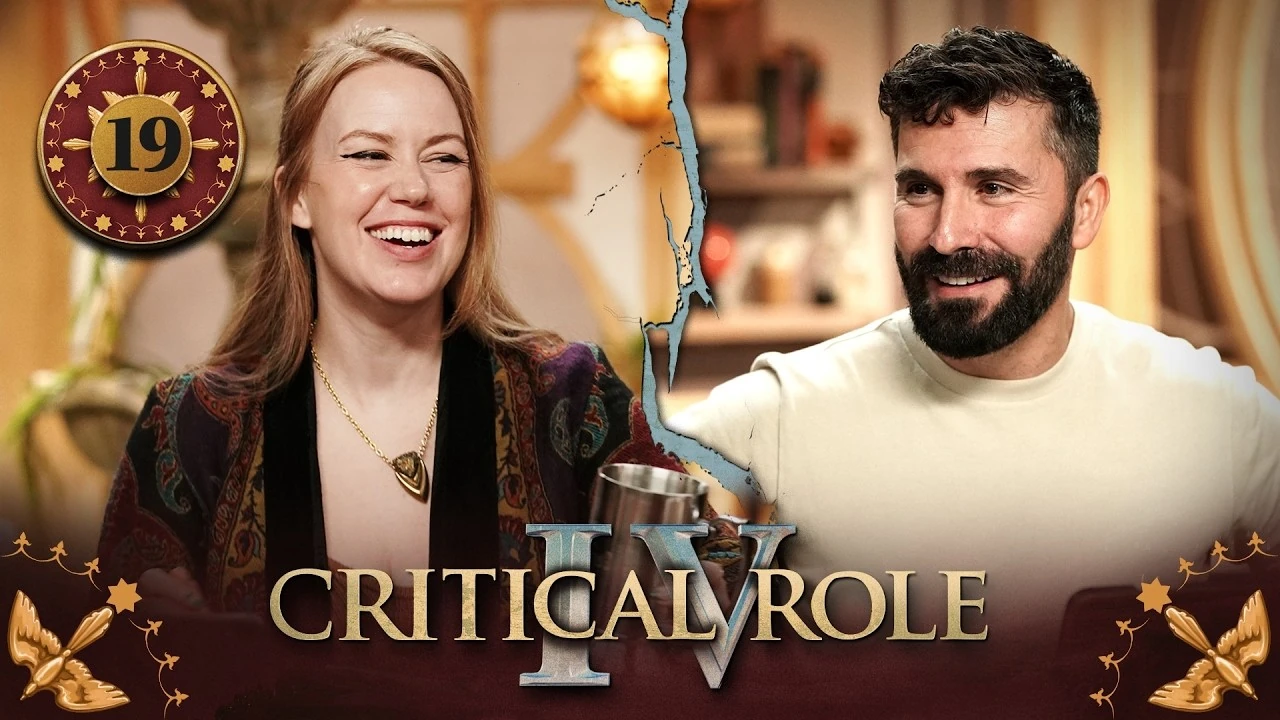 Thumbnail for Critical Role IV episode 19, with a red emblem around the episode number and birds in the bottom corners. A split image having the effect of cracked plaster, with a photo of Marisha on the left and a photo of Luis on the right. Both smiley widely. Marisha laughs, holding a silver mug and wearing a knit rug-like top and a golden necklace. Luis grins happily, wearing a plain white shirt.