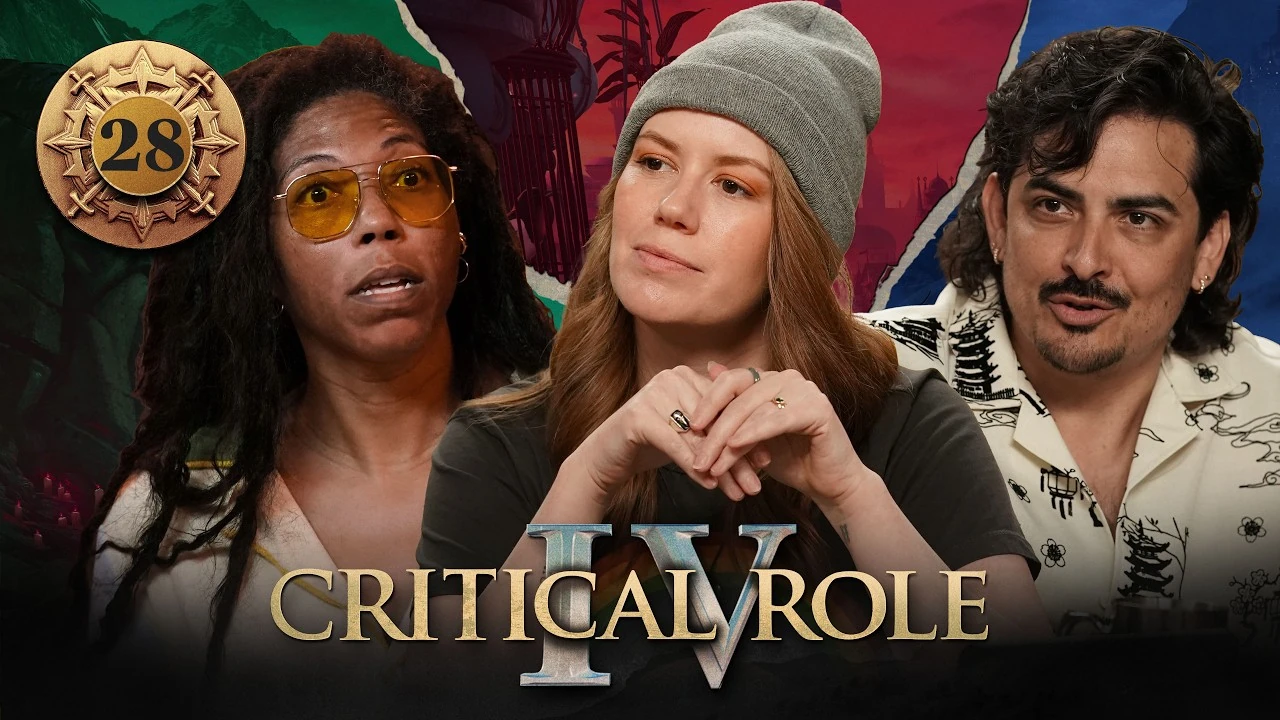 Thumbnail for Critical Role IV episode 28, with a gold emblem around the episode number. A split image having the effect of cracked plaster, with photos of Aabria, Marisha, and Robbie from left to right. The photos have had their backgrounds cut out, and behind them from left to right is artwork of a green-tinted stone bearded face, the red-tinted skyline of Dol-Makjar, and a blue-tinted misty city from a distance. Aabria has a shocked look on her face, mouth slightly open. Marisha looks thoughtful, clasping her hands in front of her and tilting her head to the side. Robbie is speaking, looking focused and confident.