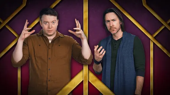 Thumbnail showing Brennan Lee Mulligan and Matt standing side-by-side. Each is framed in a section of Art Deco golden latticework over a gradient purple and red background. Brennan wears a brown button-up with dual breast pockets and looks directly at the camera, both his arms raised at a right angle as if casting a spell. Matt wears a blue vest over a green shirt and looks sadly at the viewer, one hand up as if holding something.